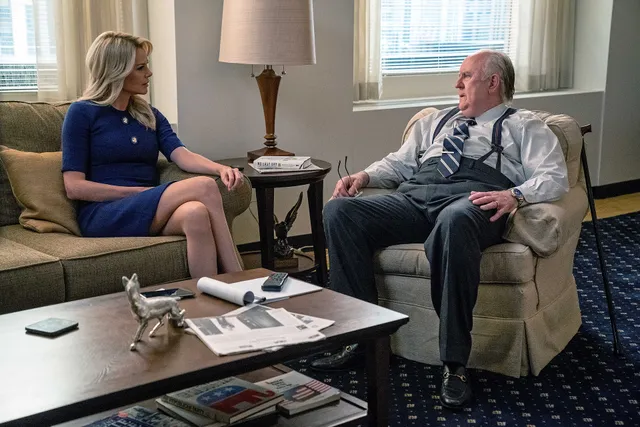 Charlize Theron as ‘Megyn Kelly’ and John Lithgow as ‘Roger Ailes’ in BOMBSHELL. Photo Credit: Hilary Bronwyn Gayle SMPSP.